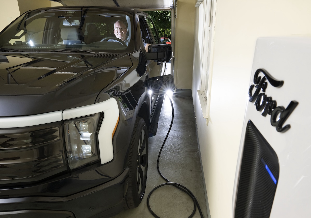 Program participant Brian Foreman sits in his Ford F-150 Lightning truck in his home garage in Howard County, Maryland. Foreman was the first person in the country to power his home with energy from his EV's battery while the grid was operating normally as part of Sunrun and BGE’s vehicle-to-home power plant initiative.